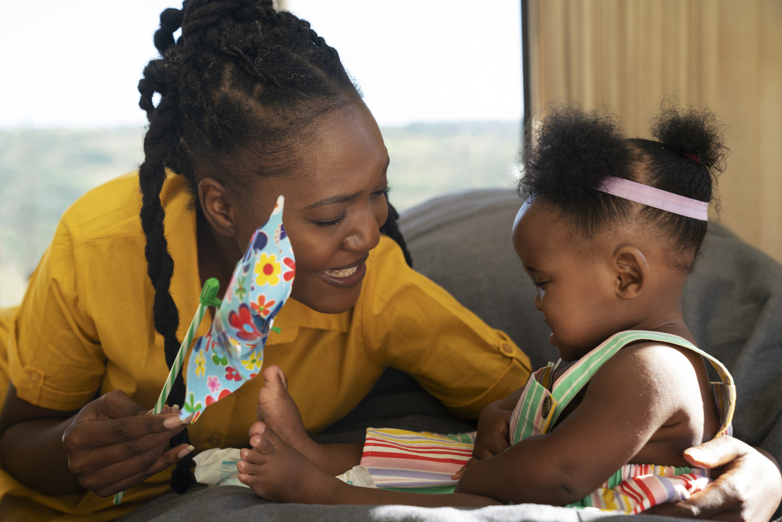 cute-black-baby-home-with-parents